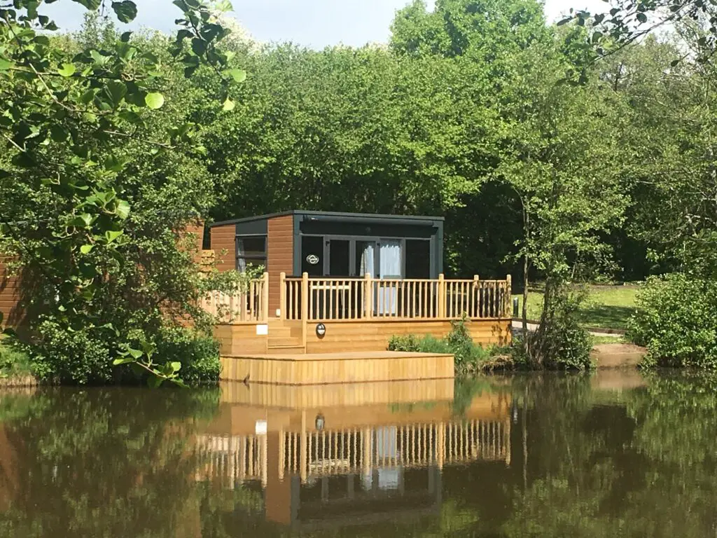 Modern luxury lodge with private peg on a carp fishing lake