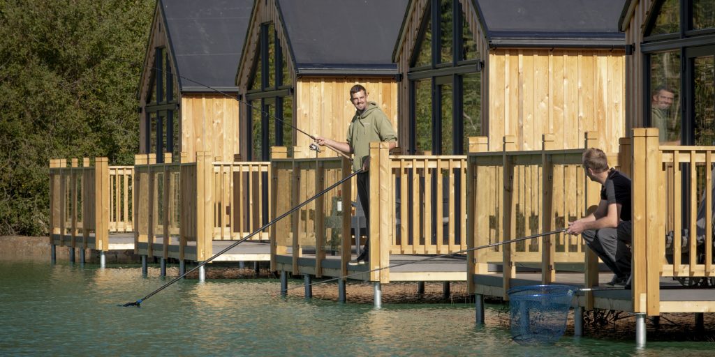 People fishing from their lodges