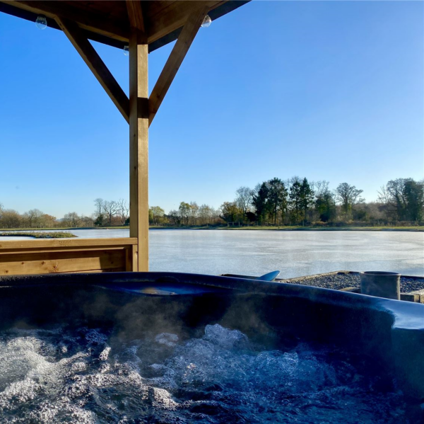 Hot tub over looking a large lake