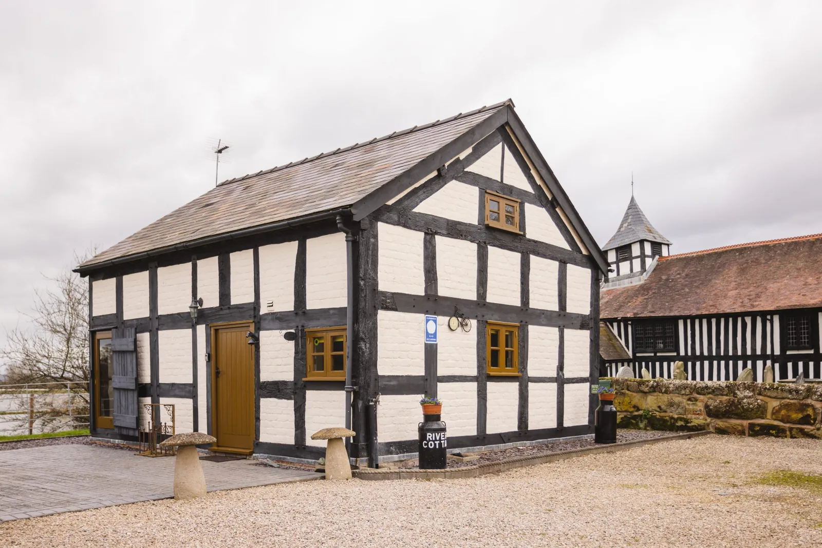 Black and white timber framed exterior of River Cottage, Melverley, Shropshire